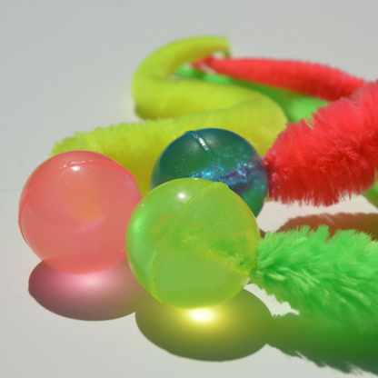 Wiggly Glow Glow in the Dark Cat Toy Bouncy Ball (Assorted Colors)