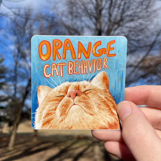 Orange Cat Behavior Sticker